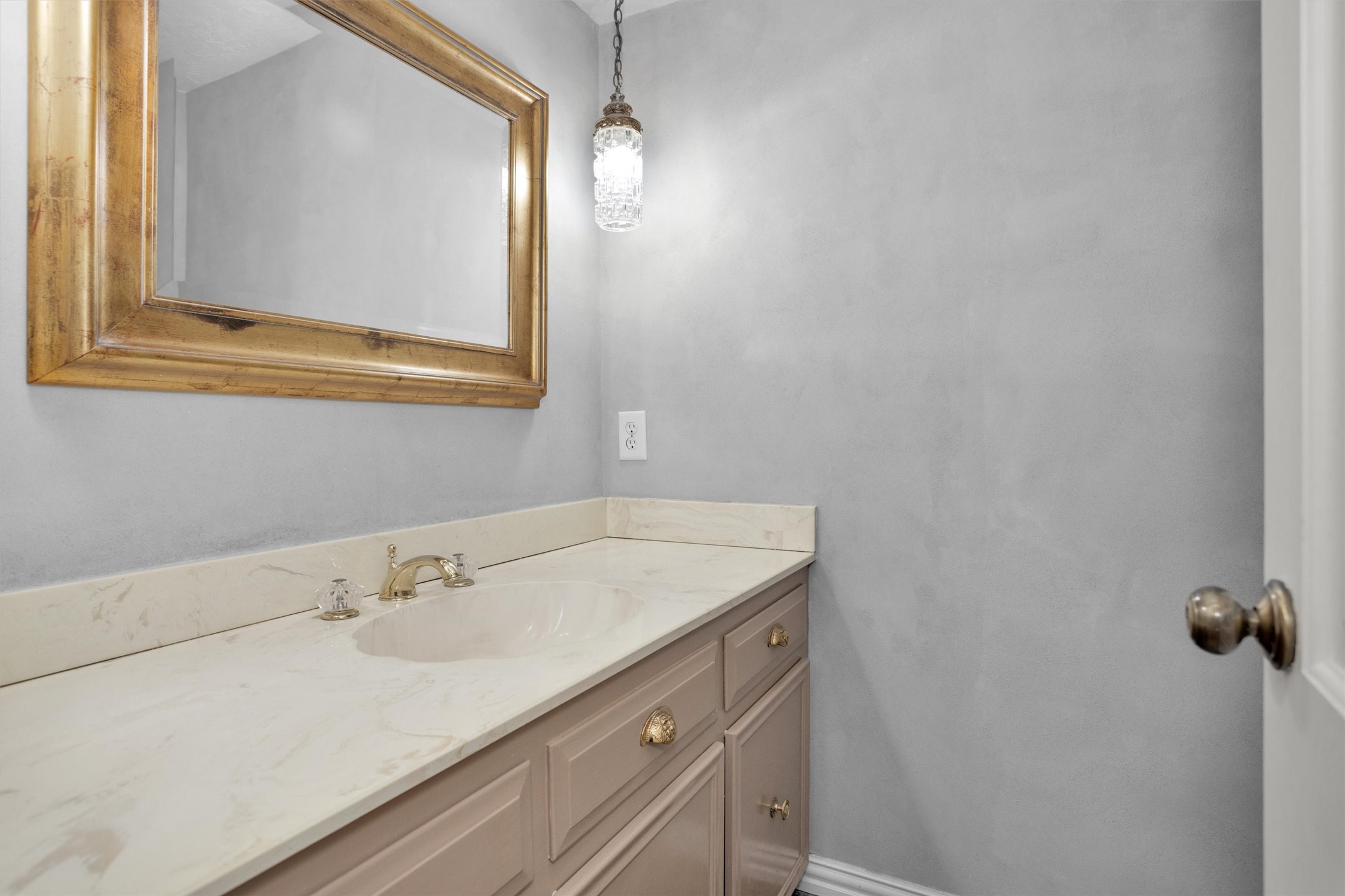 6903 Farnaby Court Spring, TX 77379 - Photo 23 of 49 a bathroom with a sink and a mirror