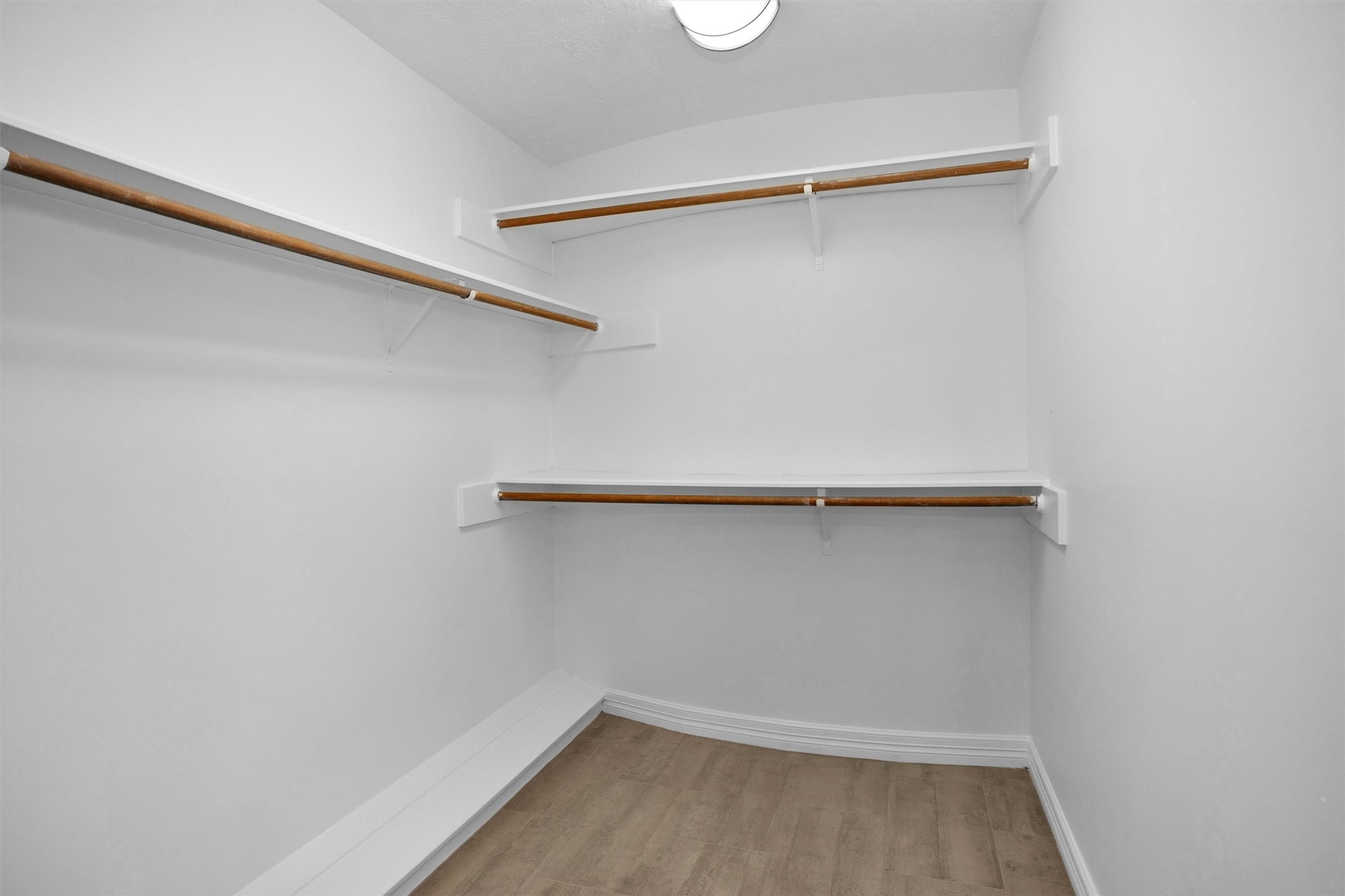 6903 Farnaby Court Spring, TX 77379 - Photo 30 of 49 a view of an empty walk in closet