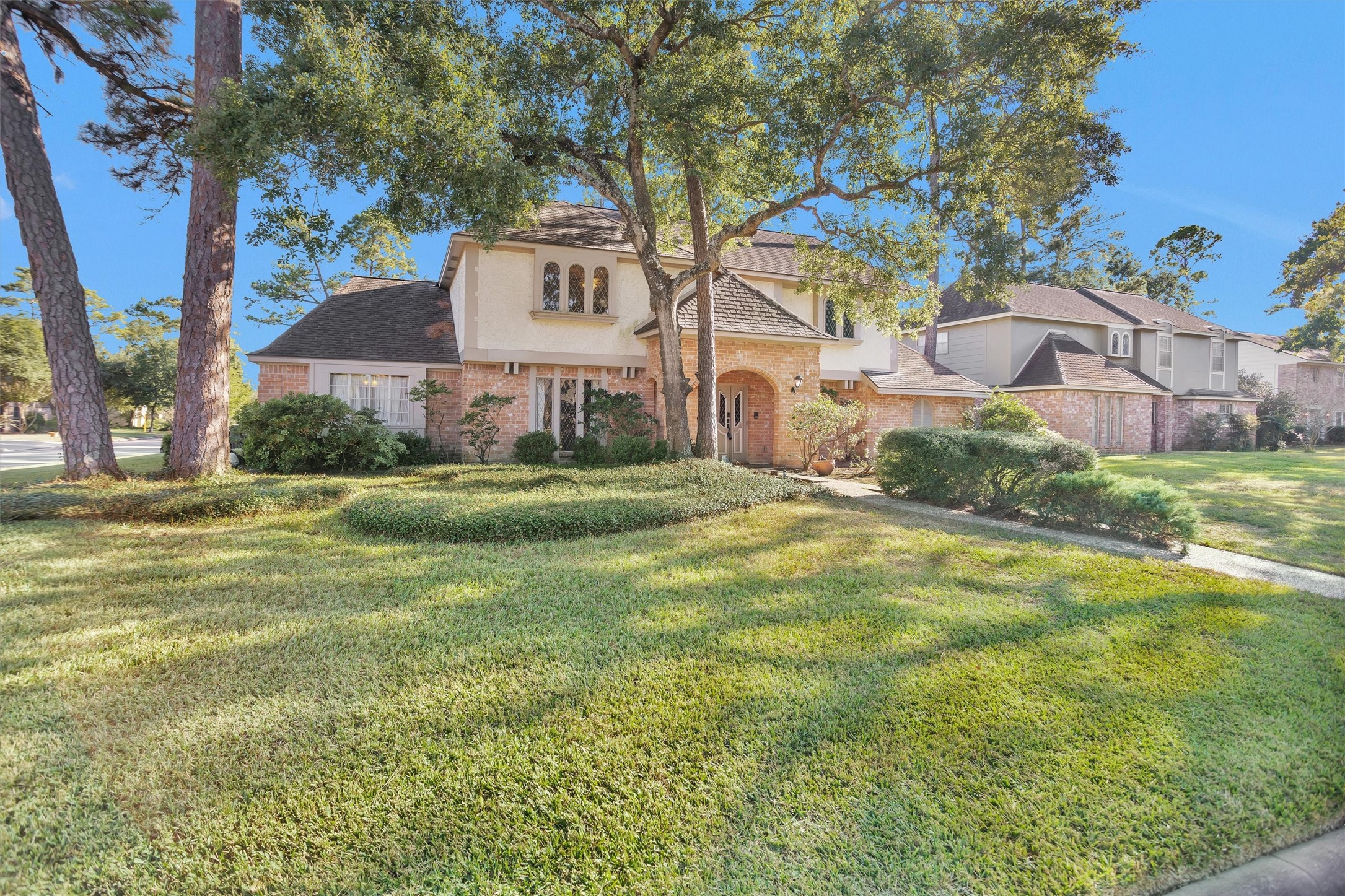 6903 Farnaby Court Spring, TX 77379 - Photo 3 of 49 a white house that has a tree in front of it