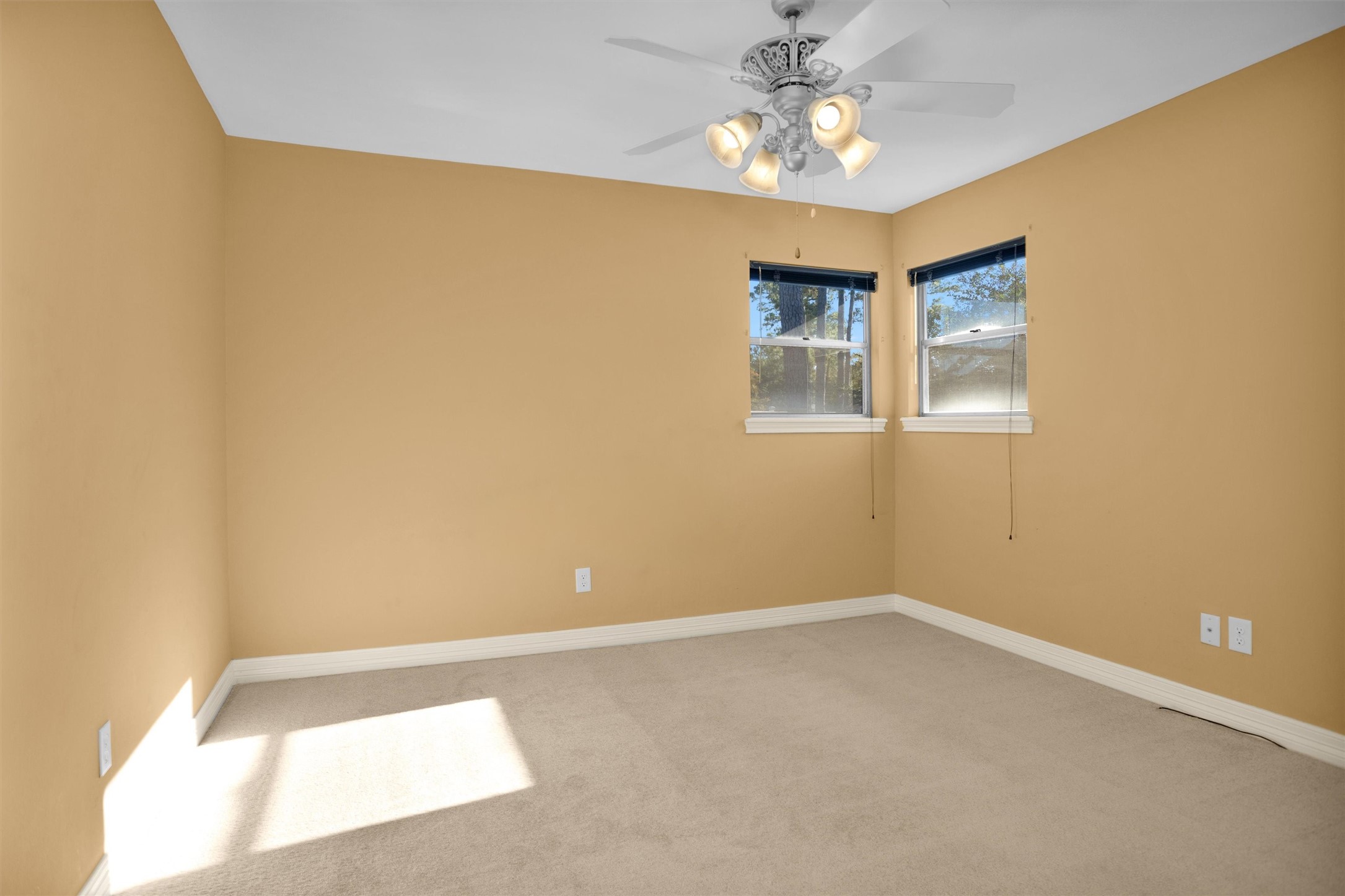 6903 Farnaby Court Spring, TX 77379 - Photo 31 of 49 a view of room with window and ceiling fan