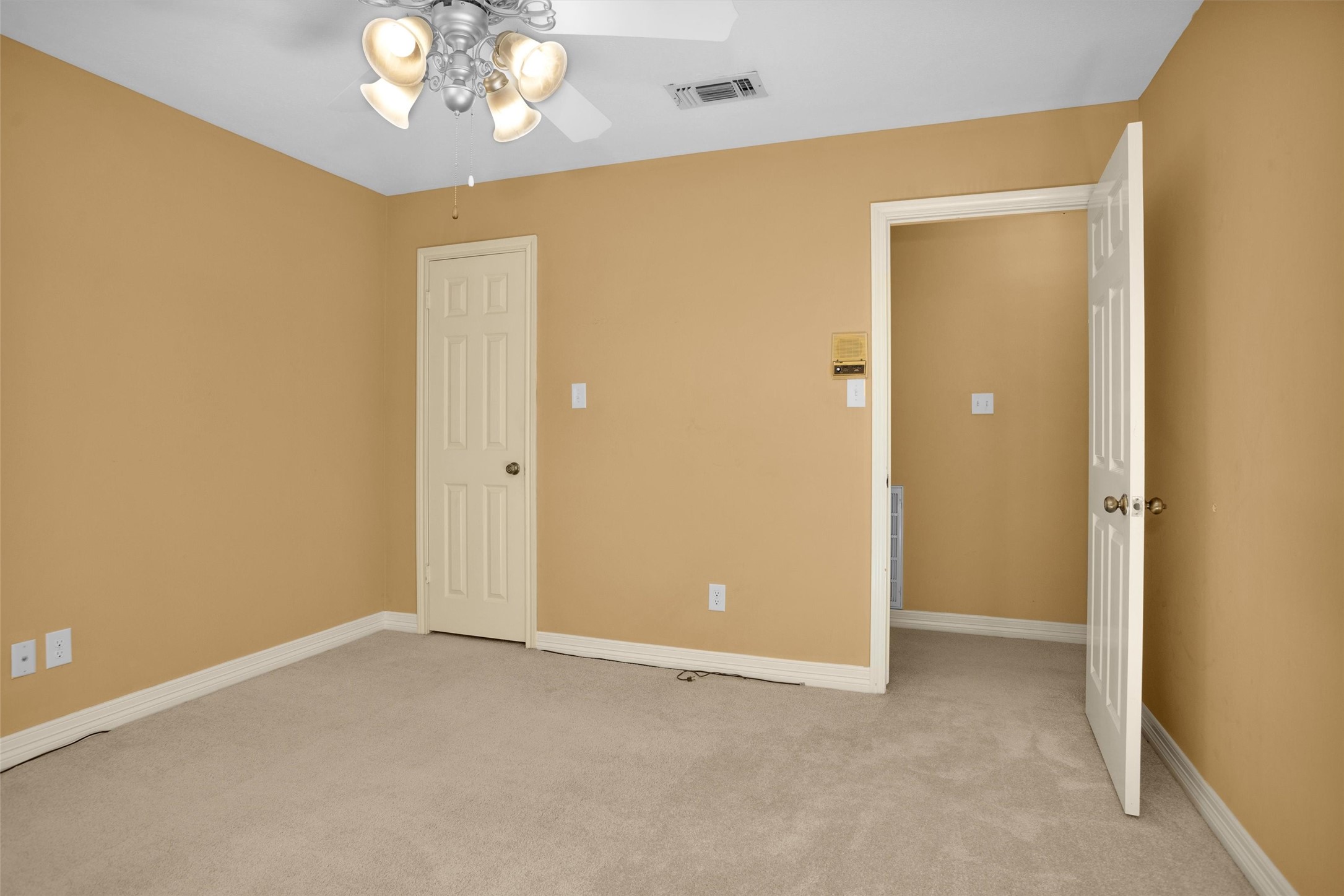 6903 Farnaby Court Spring, TX 77379 - Photo 32 of 49 a view of an empty room with a chandelier fan
