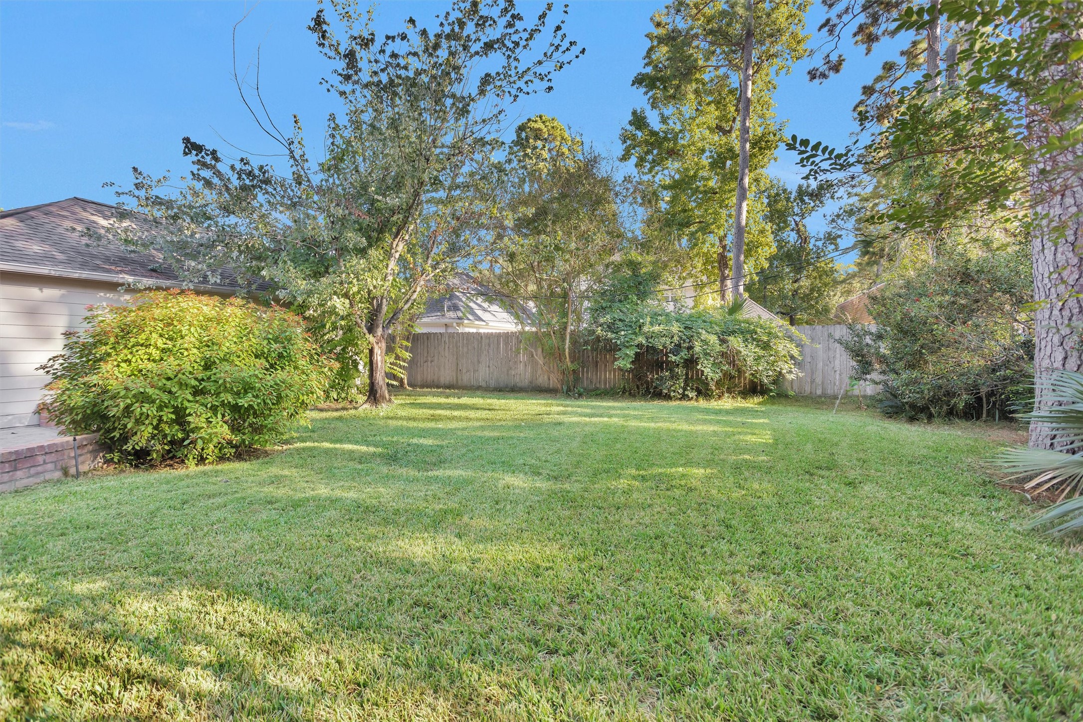 6903 Farnaby Court Spring, TX 77379 - Photo 48 of 49 a view of a house with a yard