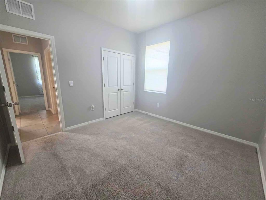 3927 Lively Coral Place Bradenton, FL 34208 - Photo 19 of 44 a view of empty room