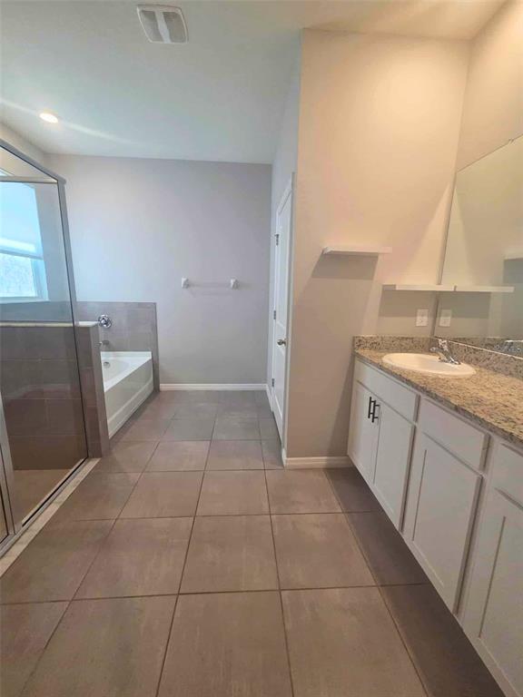 3927 Lively Coral Place Bradenton, FL 34208 - Photo 23 of 44 a kitchen with a sink a stove top oven and cabinets