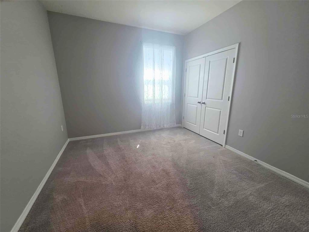 3927 Lively Coral Place Bradenton, FL 34208 - Photo 27 of 44 a view of room and window