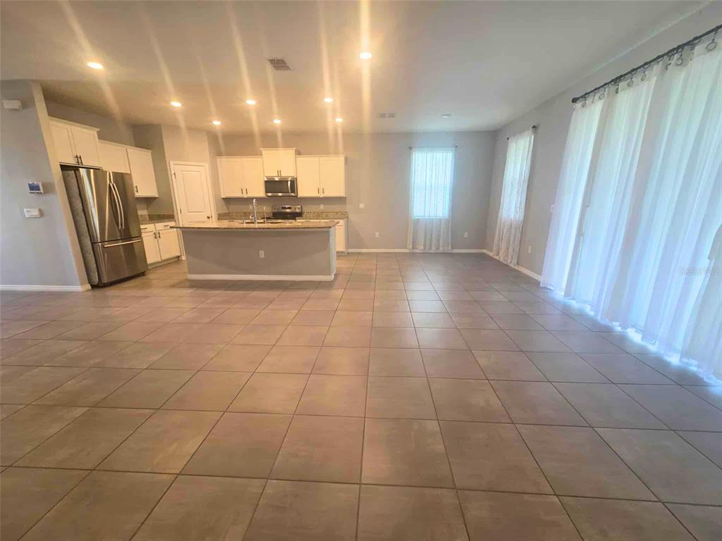 3927 Lively Coral Place Bradenton, FL 34208 - Photo 7 of 44 a view of a kitchen with a sink and cabinets