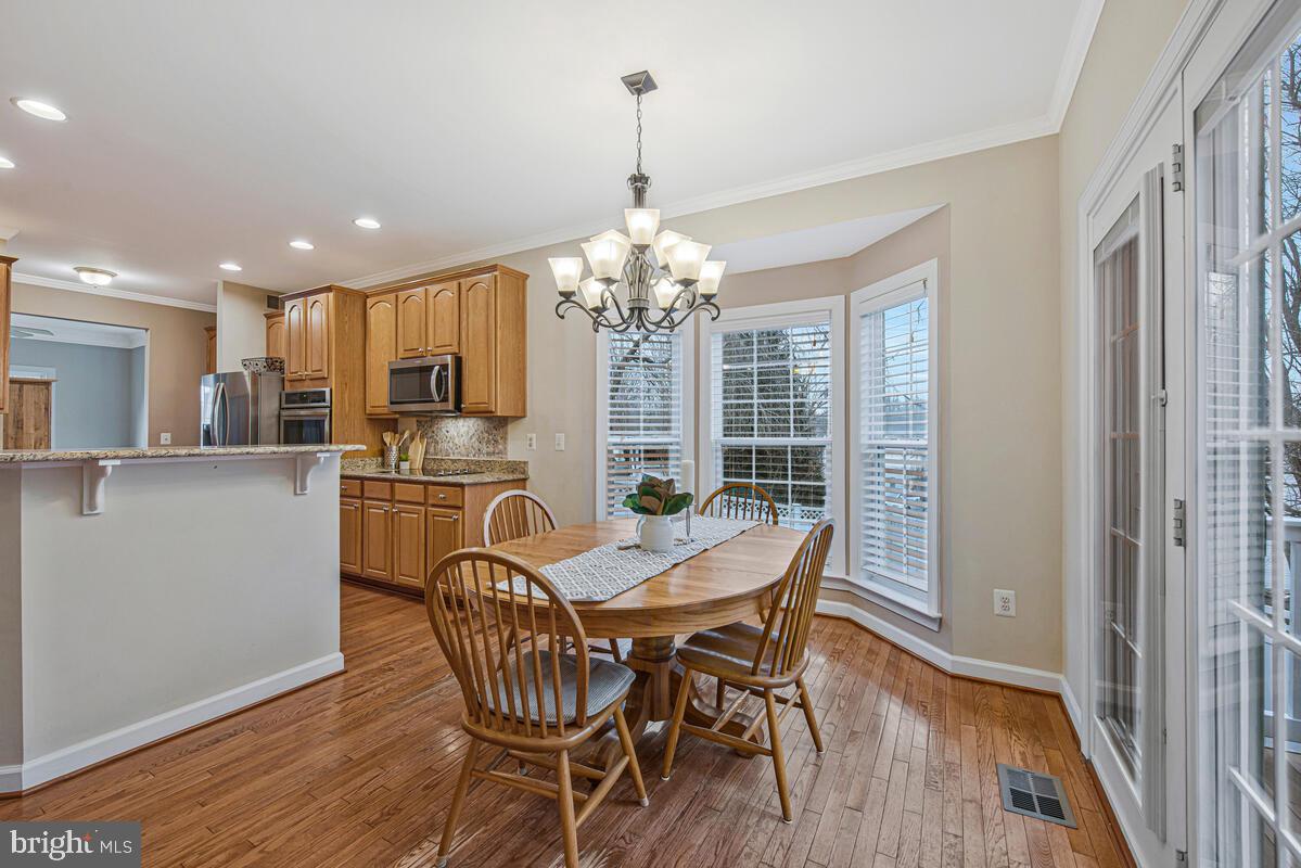 620 Crawfords Ridge Road Odenton, MD 21113 - Photo 12 of 43 a dining room with furniture and window