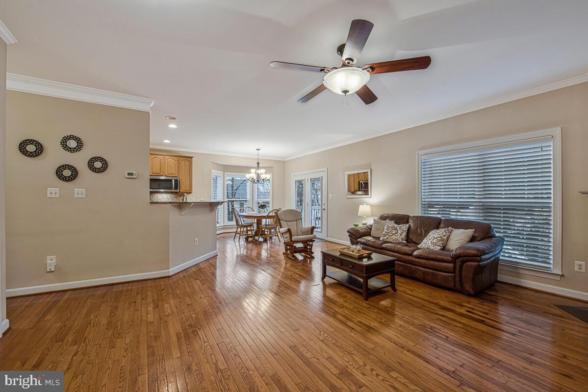 620 Crawfords Ridge Road Odenton, MD 21113 - Photo 14 of 43 a living room with furniture and wooden floor