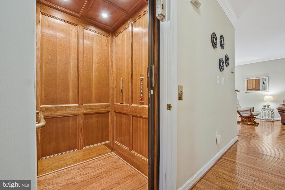 620 Crawfords Ridge Road Odenton, MD 21113 - Photo 19 of 43 a view of a hallway with wooden floor