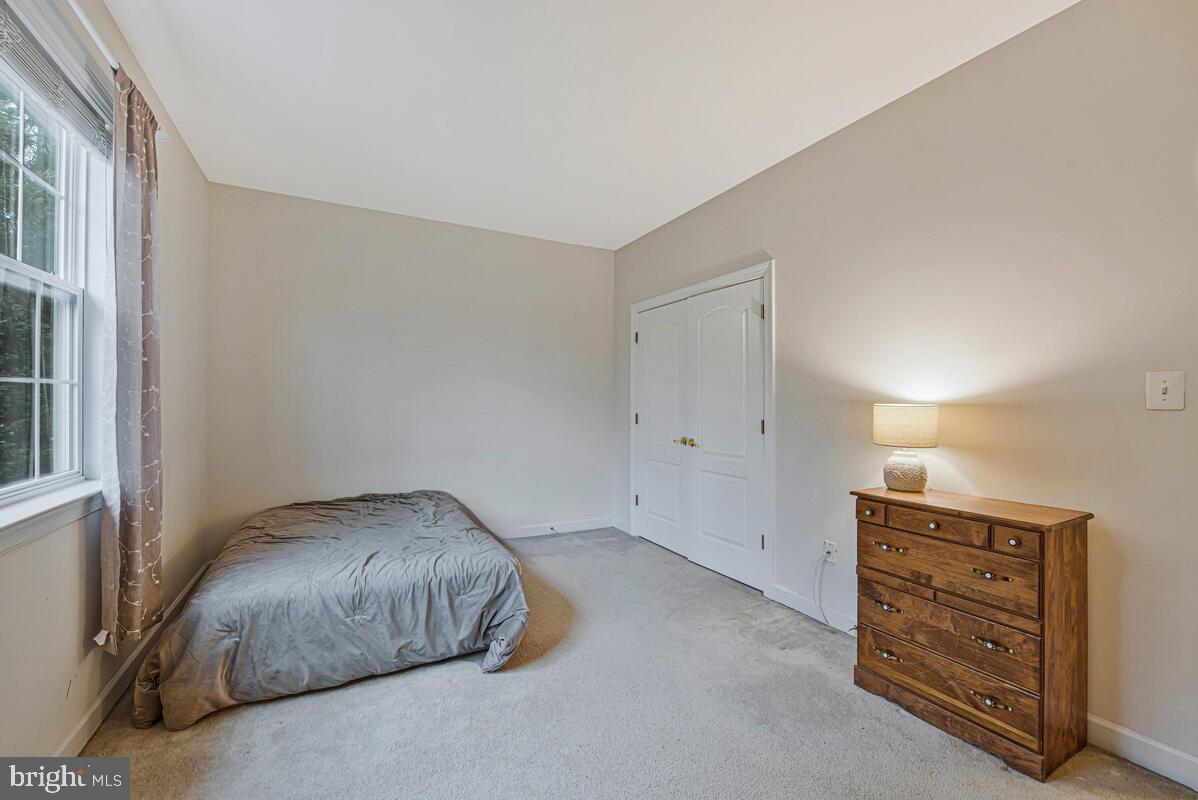 620 Crawfords Ridge Road Odenton, MD 21113 - Photo 29 of 43 an empty room with windows