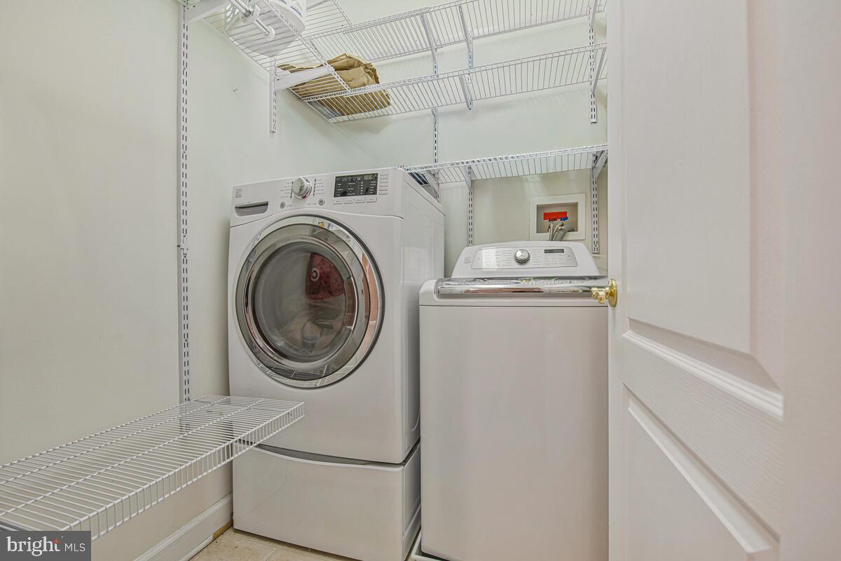 620 Crawfords Ridge Road Odenton, MD 21113 - Photo 38 of 43 a utility room with dryer and washer