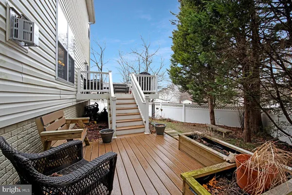a view of a balcony with chairs