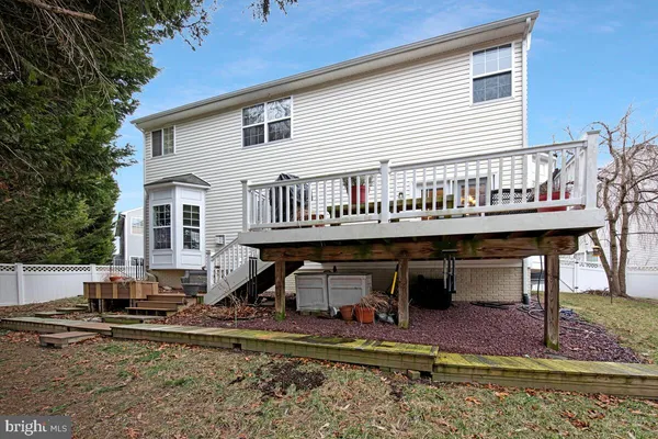 a view of a house with roof deck