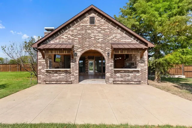 a house view with garden space