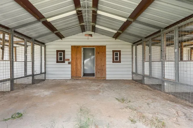 a view of a house with a big yard