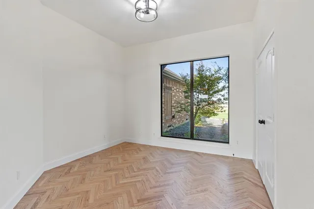 an empty room with windows