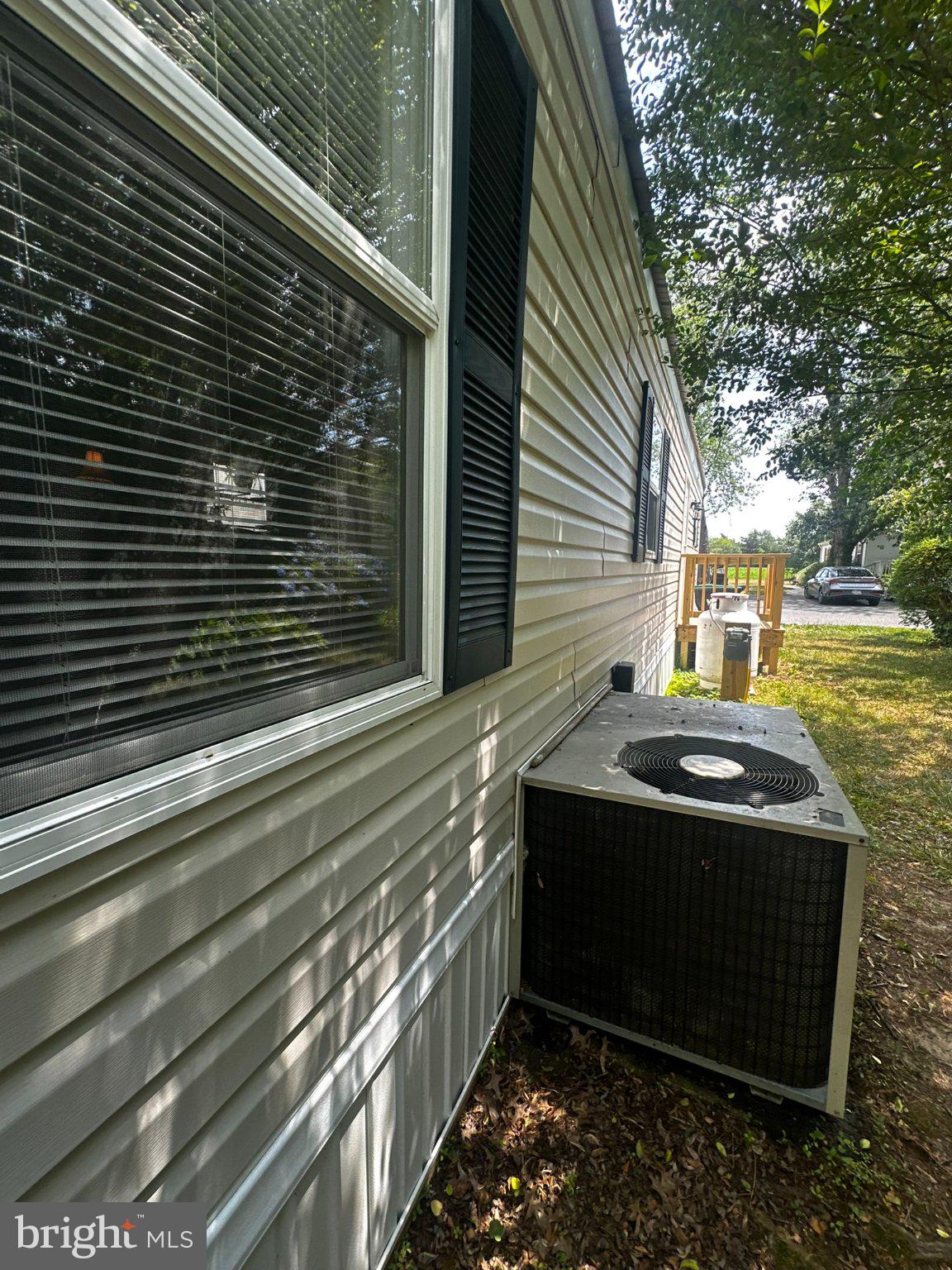 31777 Siham Road Lewes, DE 19958 - Photo 41 of 46 Charming exterior with cooling comfort.