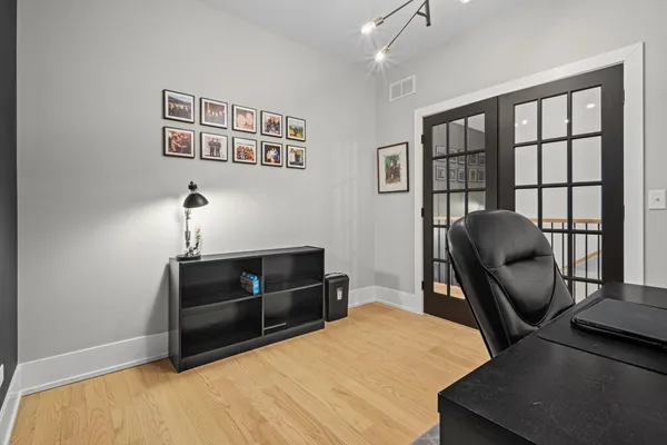 a bedroom with furniture and a window