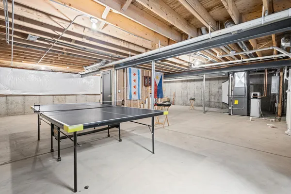 a living room with stainless steel furniture