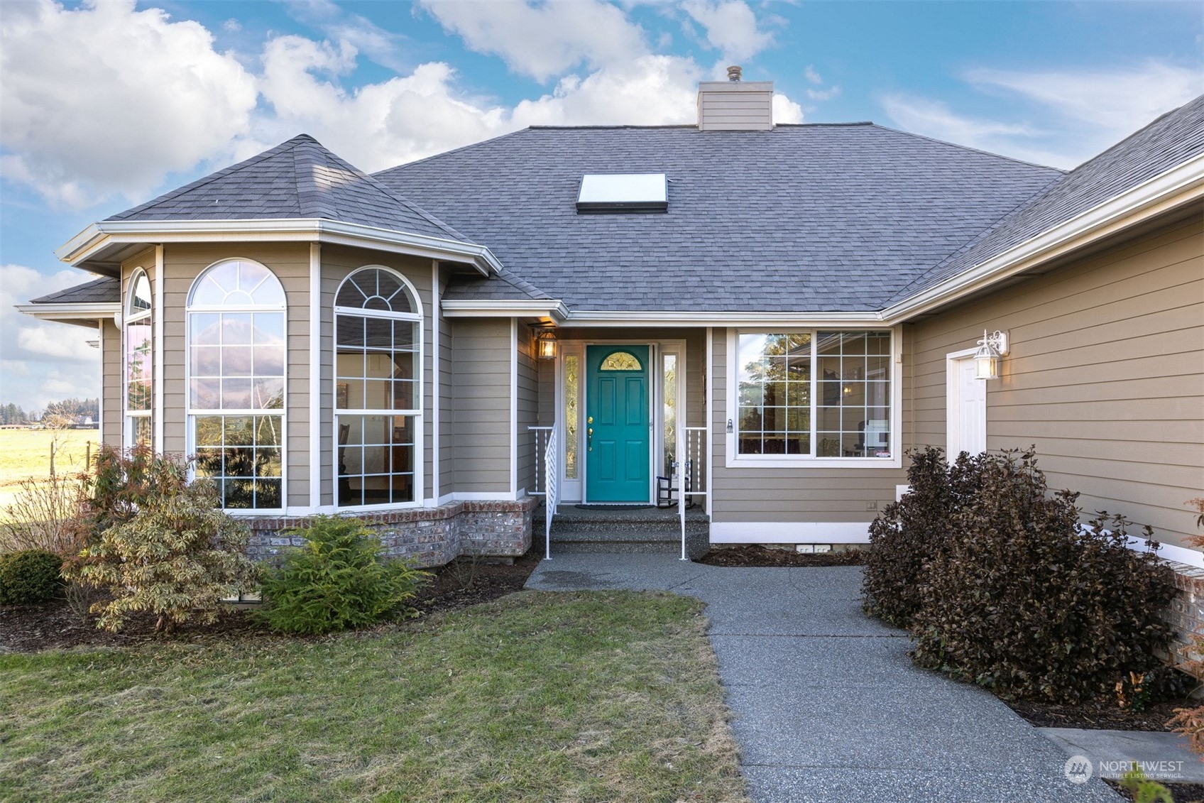 2851 Brown Road Ferndale, WA 98248 - Photo 3 of 40 a front view of a house with garden
