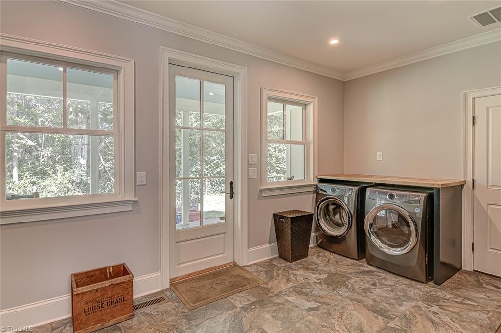305 Speaks Road Advance, NC 27006 - Photo 19 of 50 Mudroom - Opens to back deck and patio; second washer/dryer set