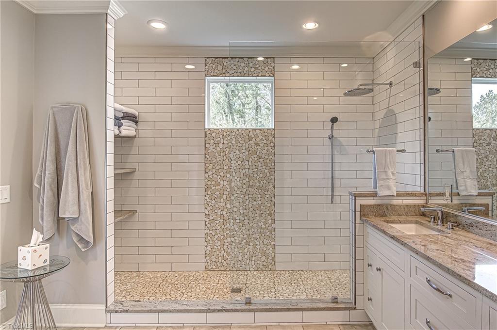 305 Speaks Road Advance, NC 27006 - Photo 24 of 50 Primary Bath - low-clearance shower door with granite shelves