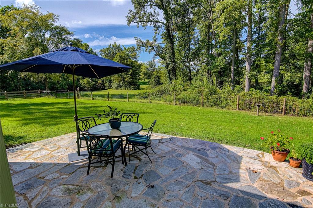 305 Speaks Road Advance, NC 27006 - Photo 37 of 50 Back patio off screen porch