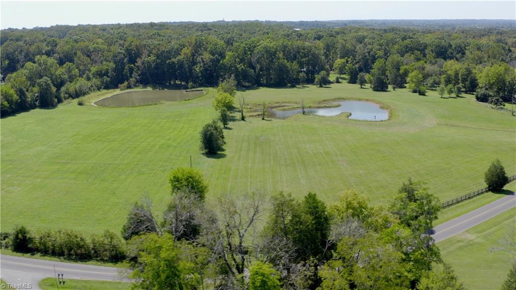 305 Speaks Road Advance, NC 27006 - Photo 45 of 50 Irregular shaped water is a "technical pond" built for training retrievers - see property video for brief demonstration
