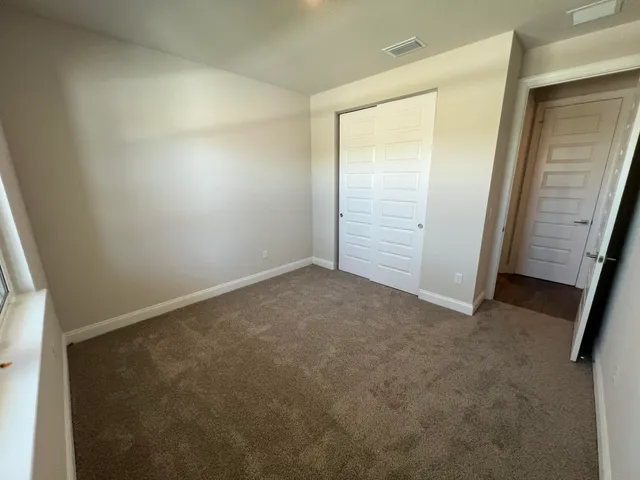 an empty room with closet