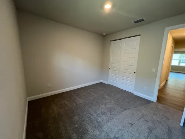 an empty room with closet