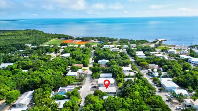 swimming pool view with a outdoor seating