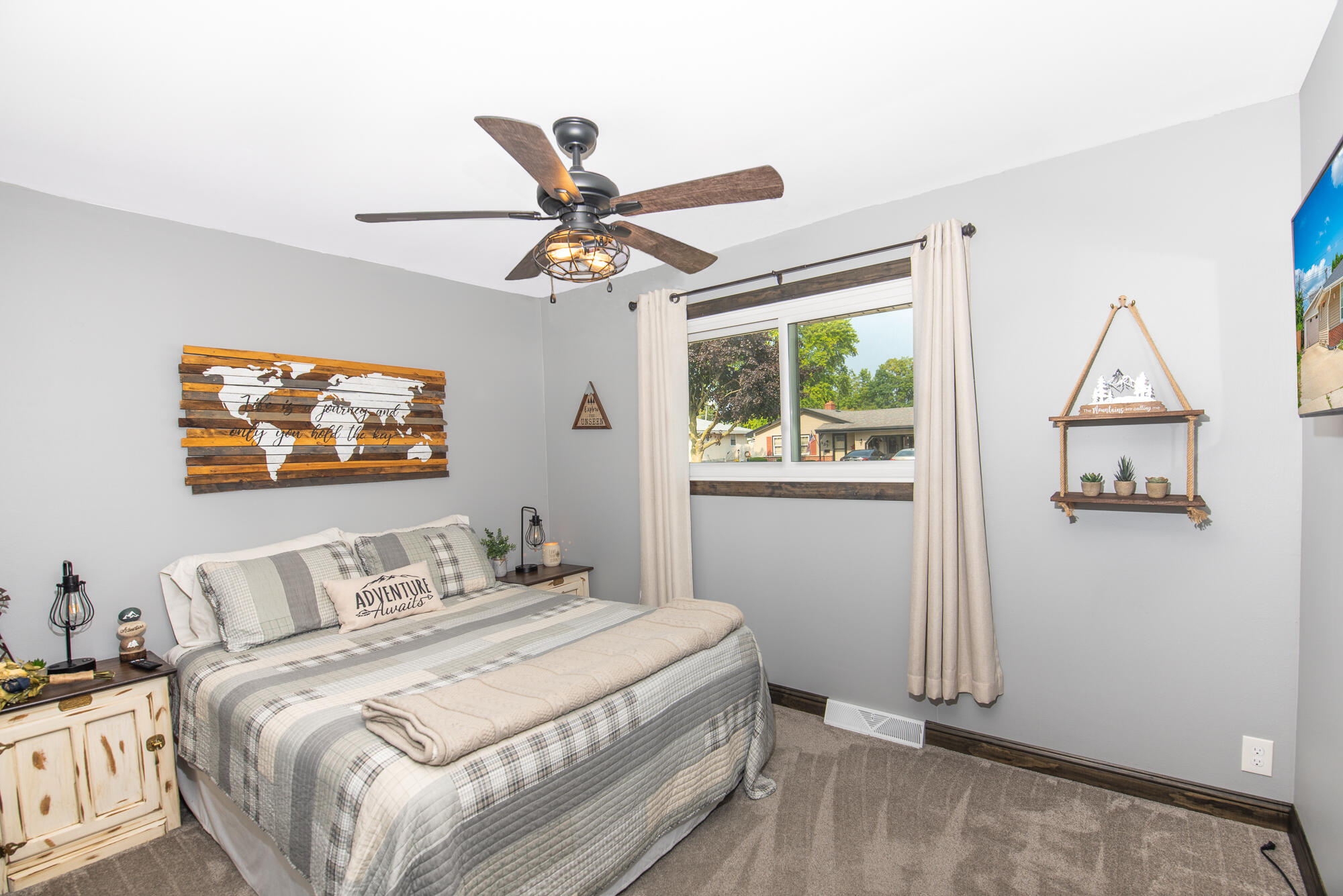 4132 Lasalle Street Racine, WI 53402 - Photo 12 of 21 Carpeted and ceiling fan in Bedroom 3 with flatscreen TV