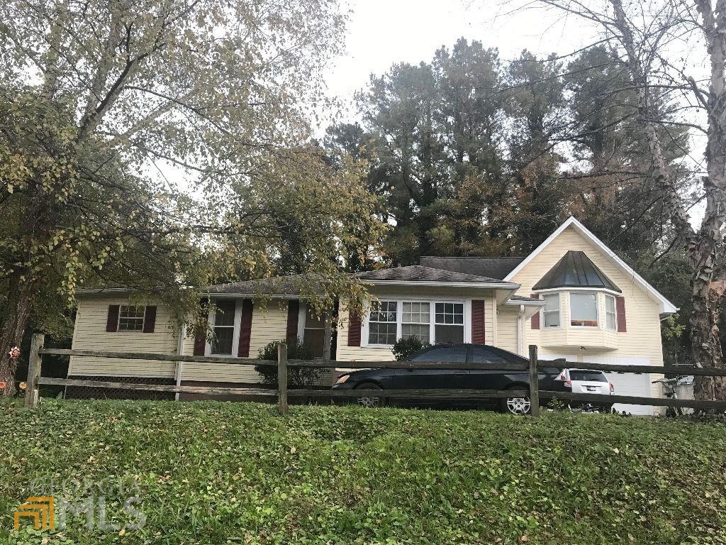 306 Couper Street Northeast Rome, GA 30161 - Photo 1 of 1 a house view with a garden space