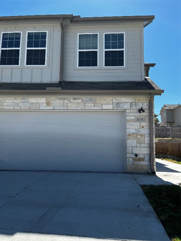 109 Dodge Road Georgetown, TX 78626 - Photo 1 of 1 a view of garage with a large window
