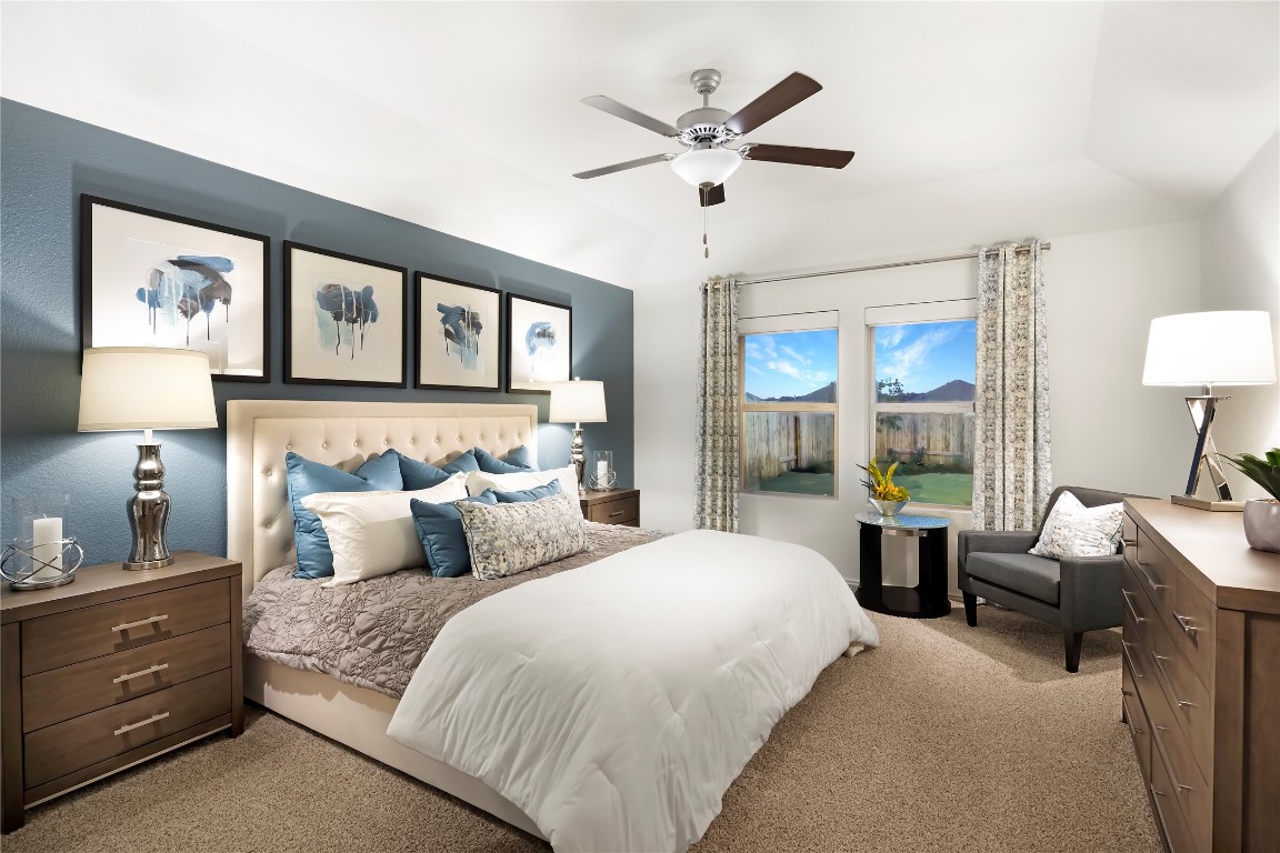 1133 Nesting Bird Drive Georgetown, TX 78628 - Photo 7 of 10 a bedroom with a large bed and a window