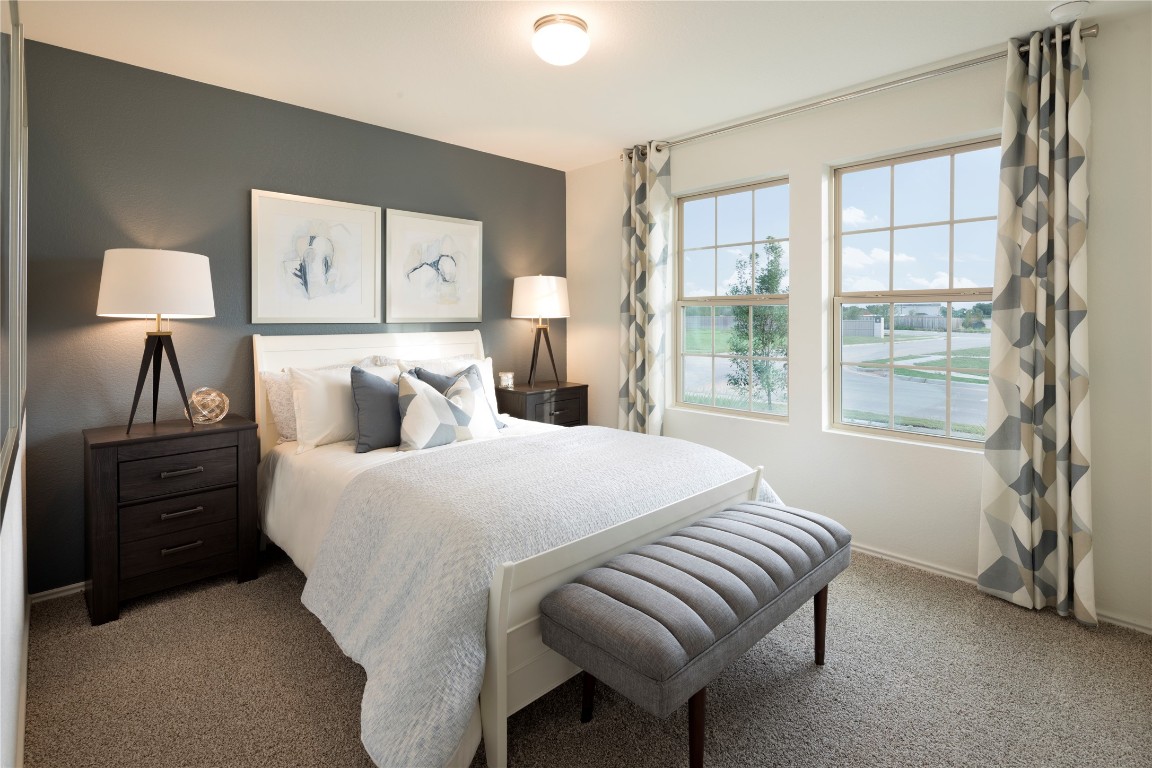 1133 Nesting Bird Drive Georgetown, TX 78628 - Photo 10 of 10 a bedroom with a bed and a window