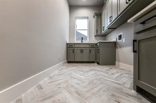 a view of a kitchen with a sink