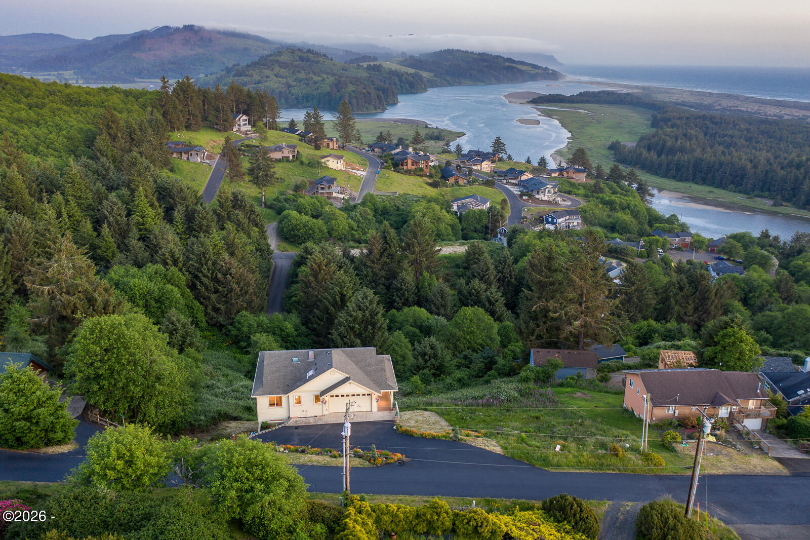 7415 East Summit Road Pacific City, OR 97135 - Photo 41 of 44 an aerial view of a house with a garden
