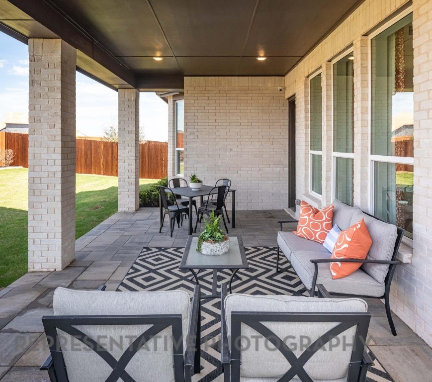 22210 Mount Whitney Road Waller, TX 77484 - Photo 27 of 29 a view of a patio with dining table and chairs