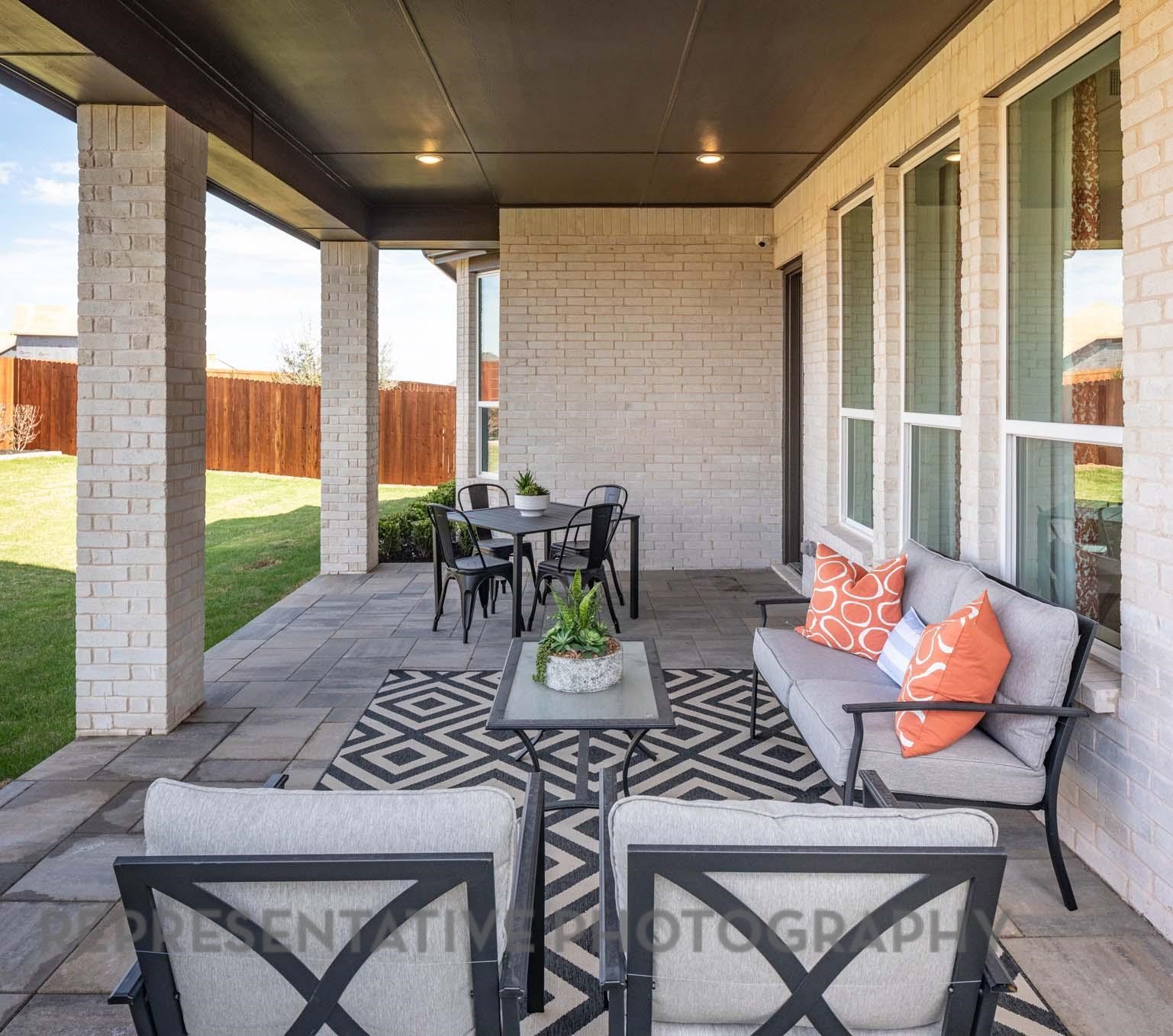 22210 Mount Whitney Road Waller, TX 77484 - Photo 27 of 29 a view of a patio with dining table and chairs