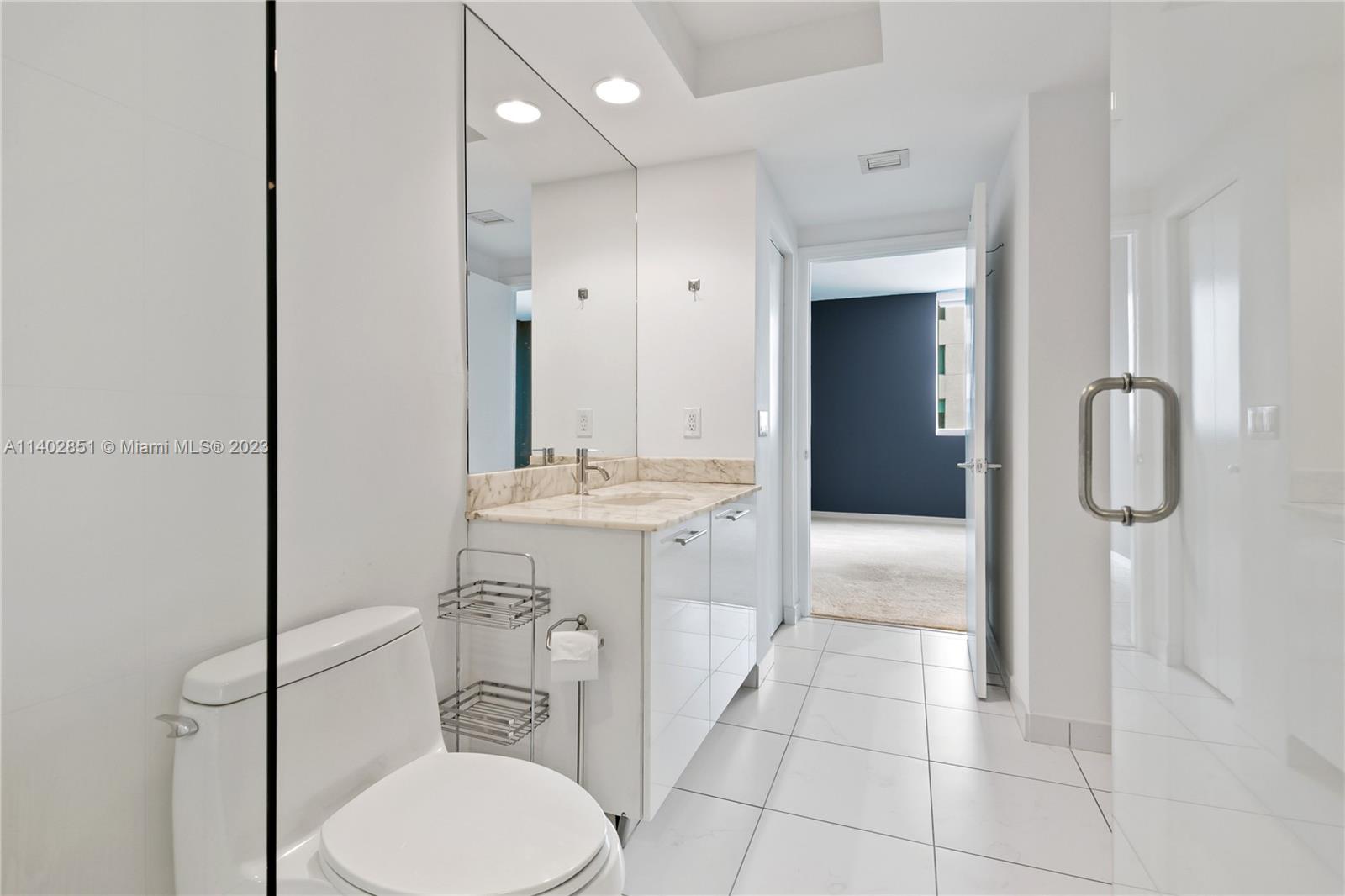 500 Brickell Avenue, Unit 2007 Miami, FL 33131 - Photo 13 of 31 a bathroom with a sink a toilet and shower