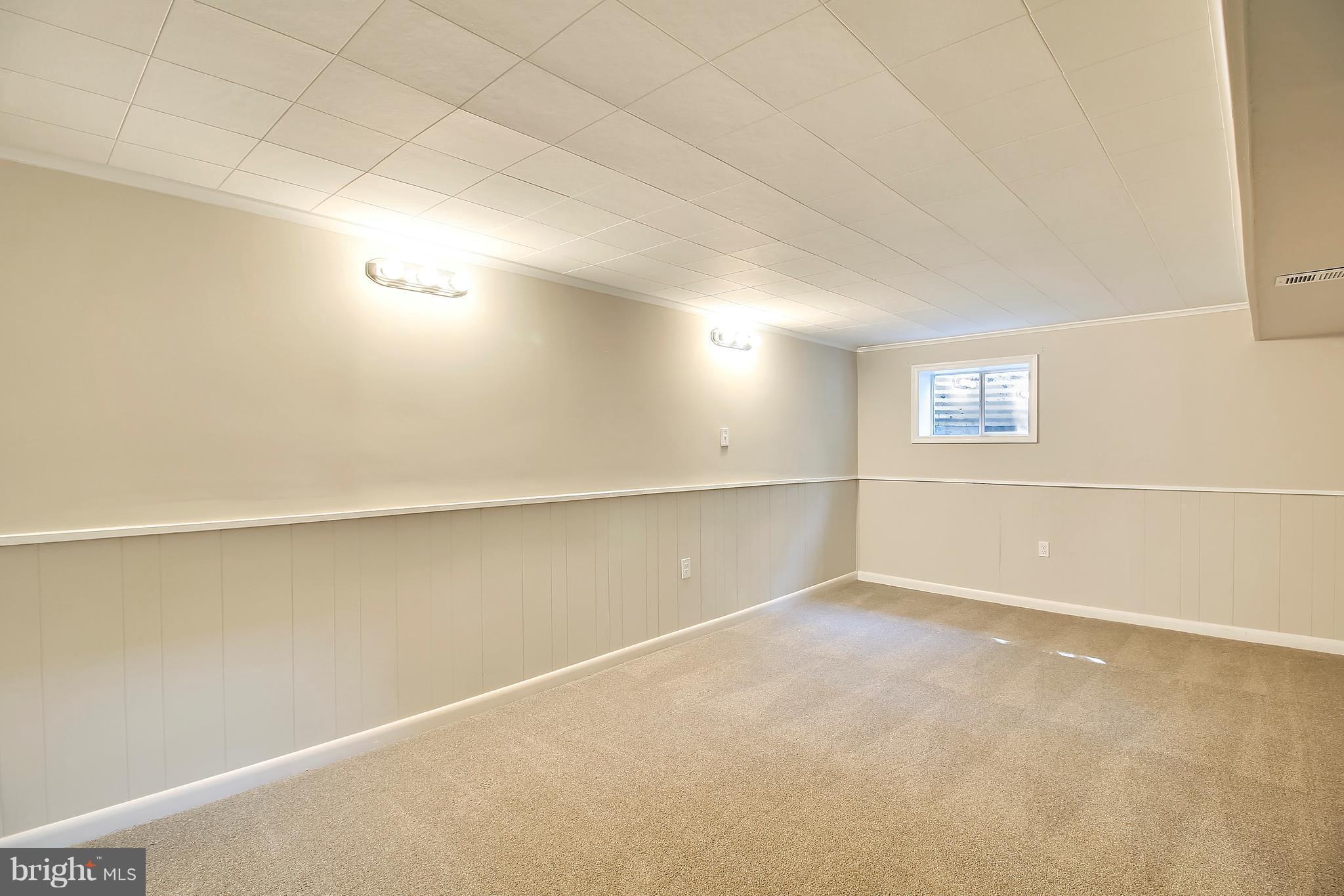 13106 Estelle Road Silver Spring, MD 20906 - Photo 17 of 21 an empty room with windows