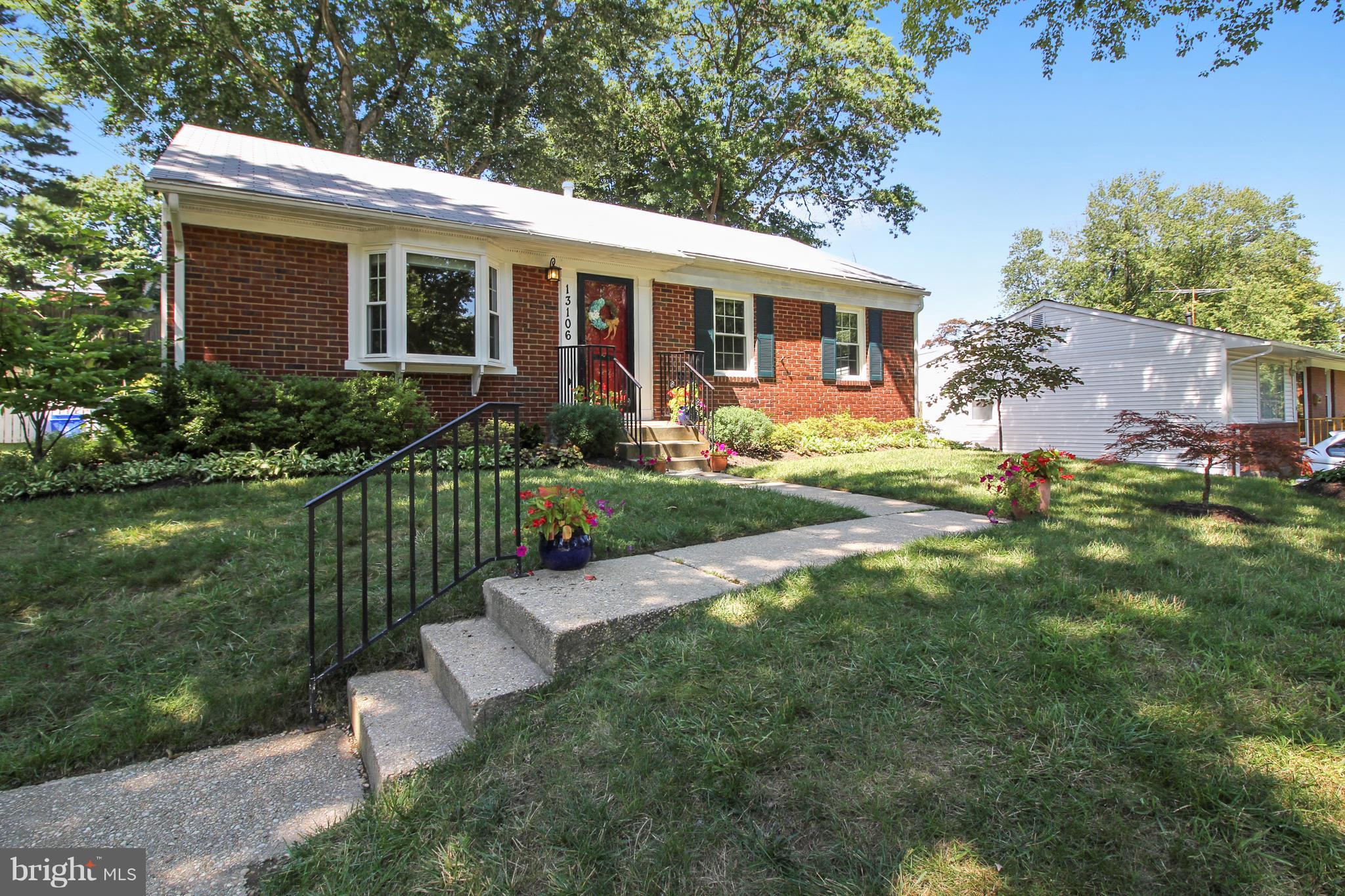 13106 Estelle Road Silver Spring, MD 20906 - Photo 21 of 21 a view of a house with a yard and a garden
