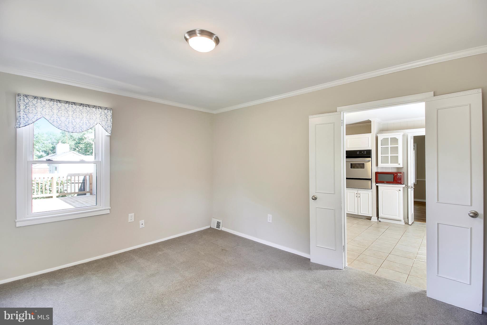 13106 Estelle Road Silver Spring, MD 20906 - Photo 9 of 21 an empty room with windows