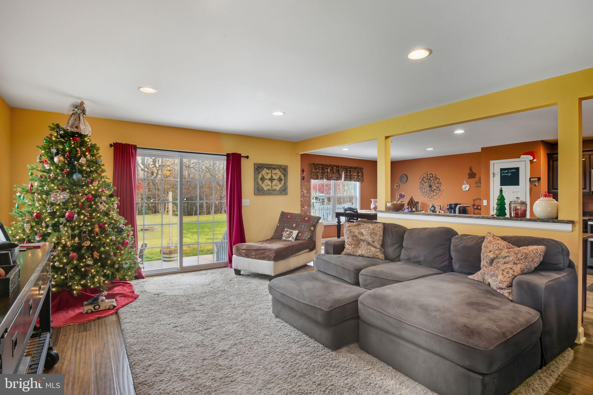24712 Tribbett Circle Ridgely, MD 21660 - Photo 11 of 37 a living room with furniture and a large window