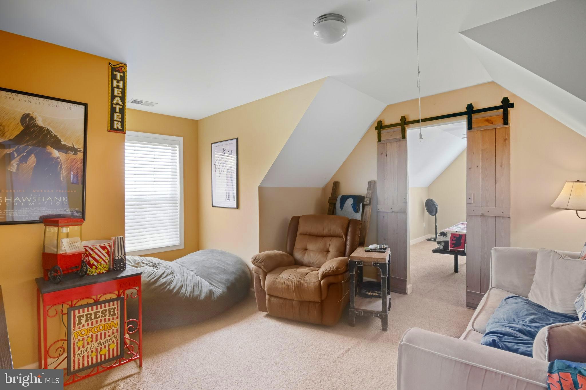 24712 Tribbett Circle Ridgely, MD 21660 - Photo 16 of 37 a living room with furniture and a painting on the wall