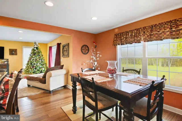 a view of a livingroom with furniture and a flat screen tv