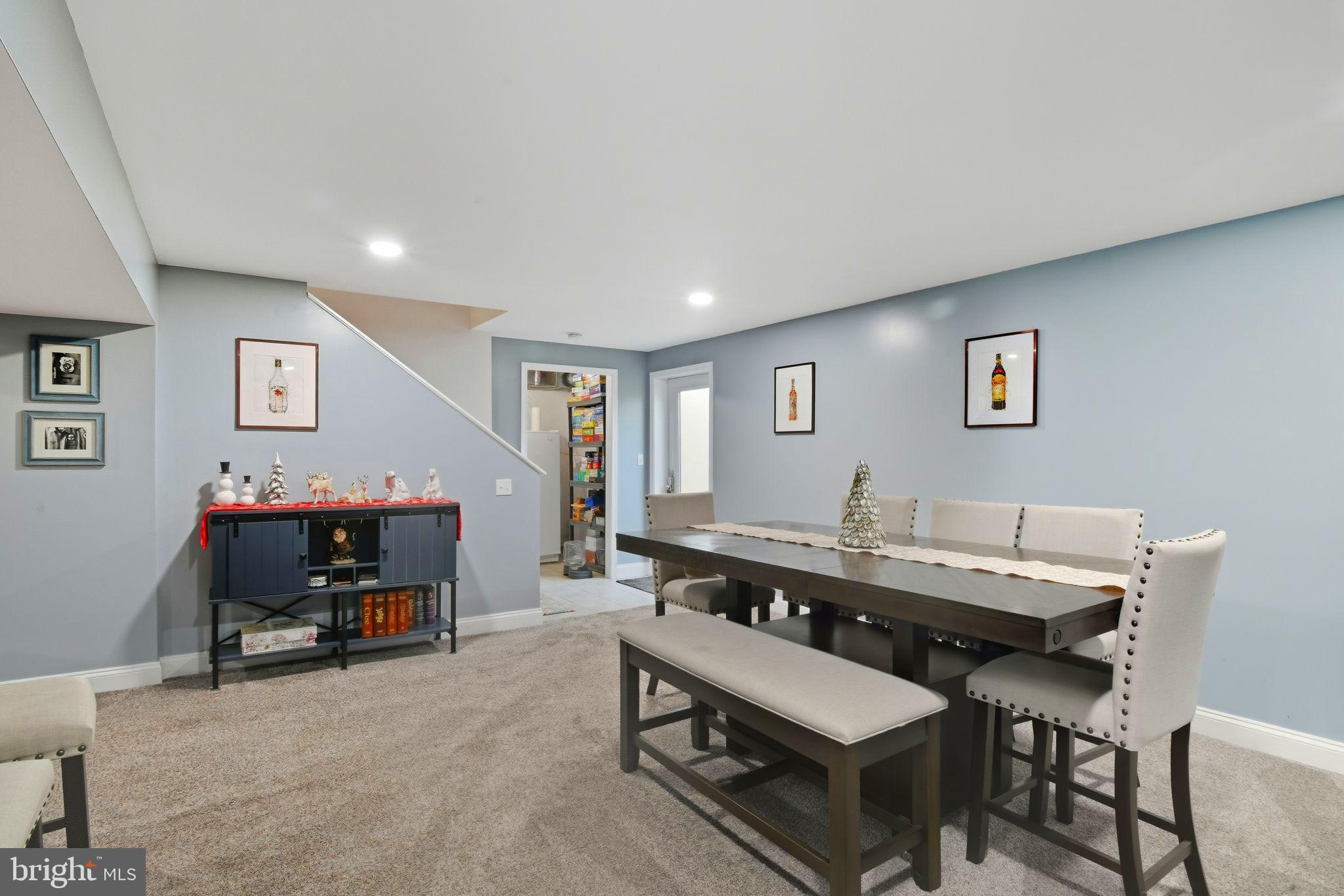 24712 Tribbett Circle Ridgely, MD 21660 - Photo 25 of 37 a living room with furniture and a flat screen tv