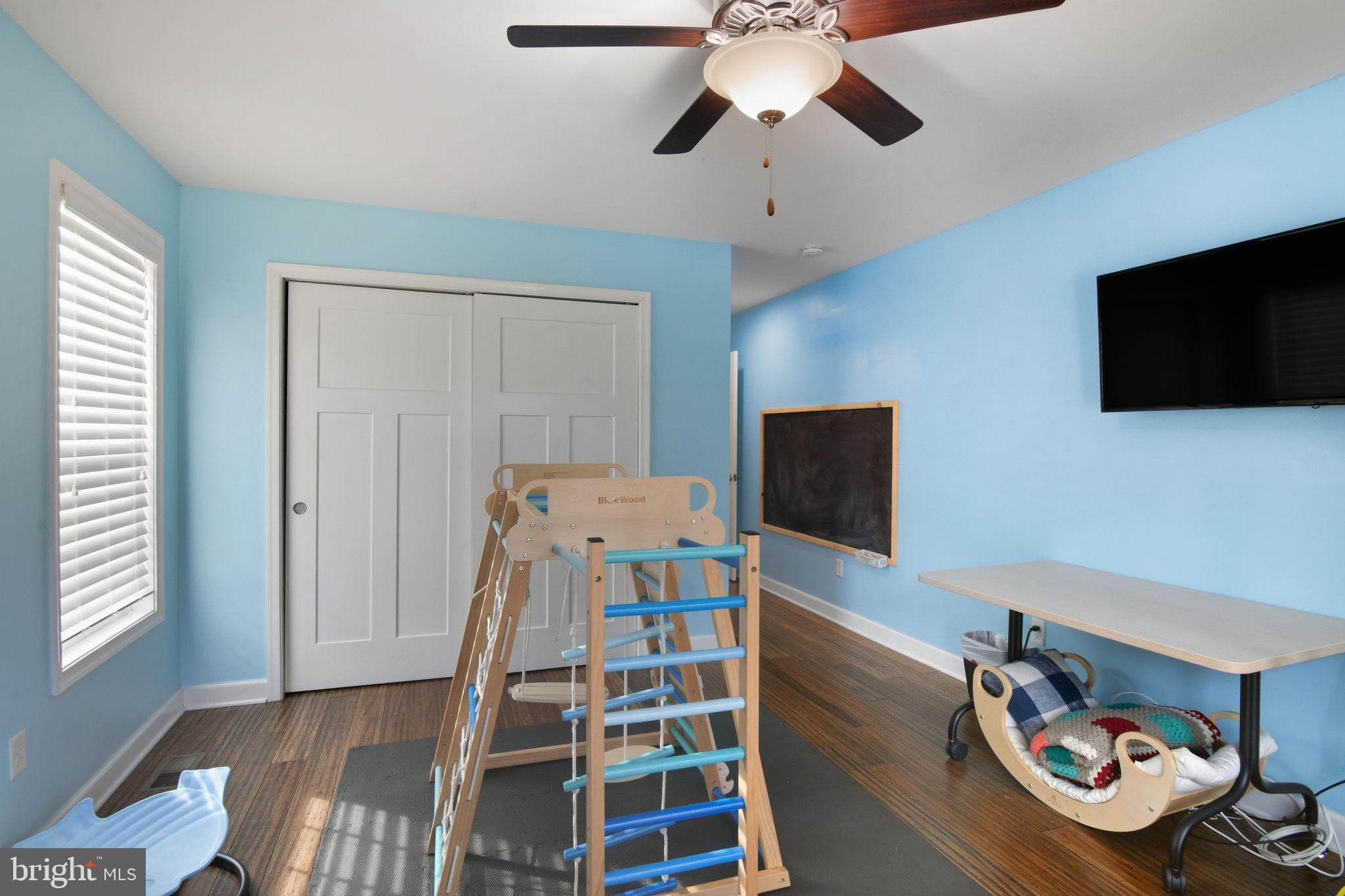 24712 Tribbett Circle Ridgely, MD 21660 - Photo 28 of 37 wooden floor in an empty room with a window