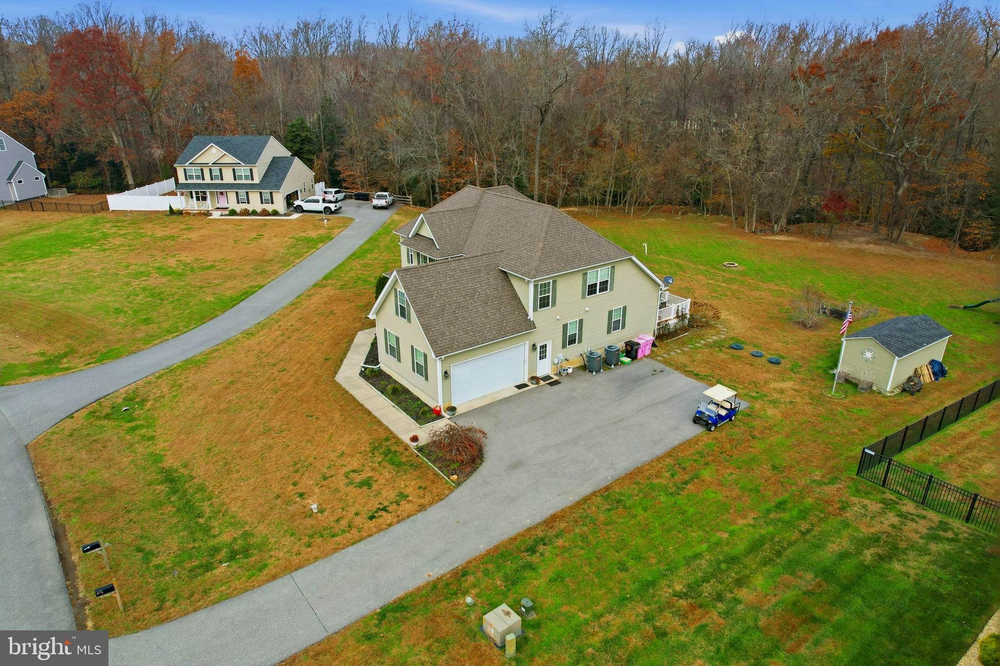 24712 Tribbett Circle Ridgely, MD 21660 - Photo 3 of 37 a view of a swimming pool with a yard